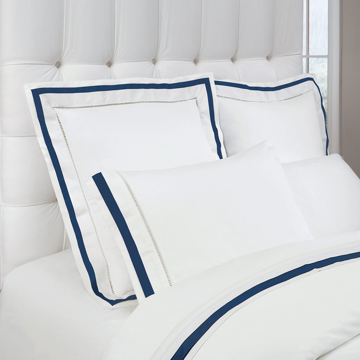 Lifestyle View of Downtown Company Chelsea Bedding in White Navy Color