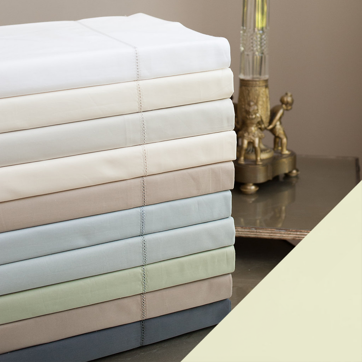Stack of Home Treasures Perla Percale Bedding with Mint Green Swatch Color