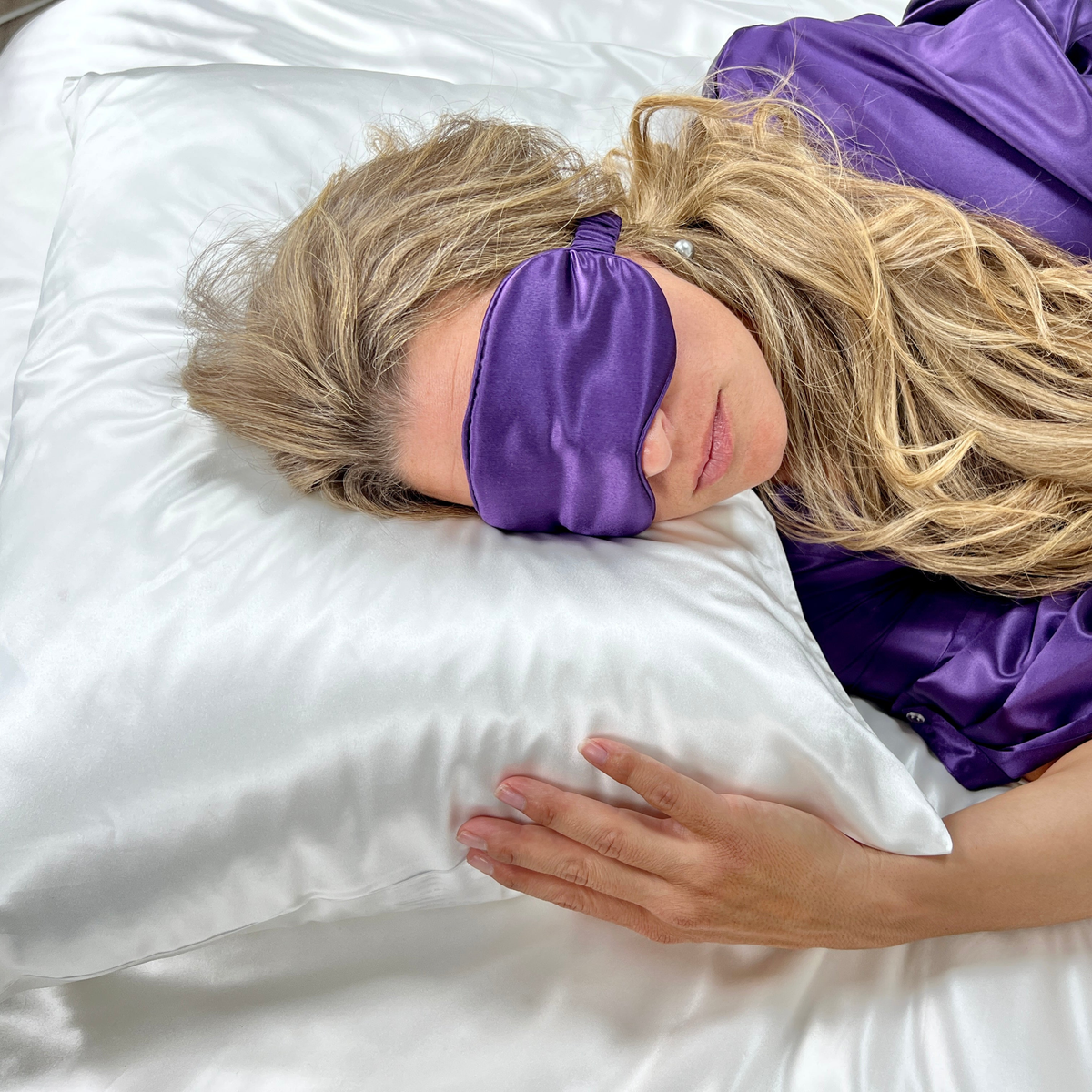 Model Sleeping with Mulberry Park Silks 22 Momme Silk Pillowcase &amp; Plum Silk Sleep Mask Gift Sets