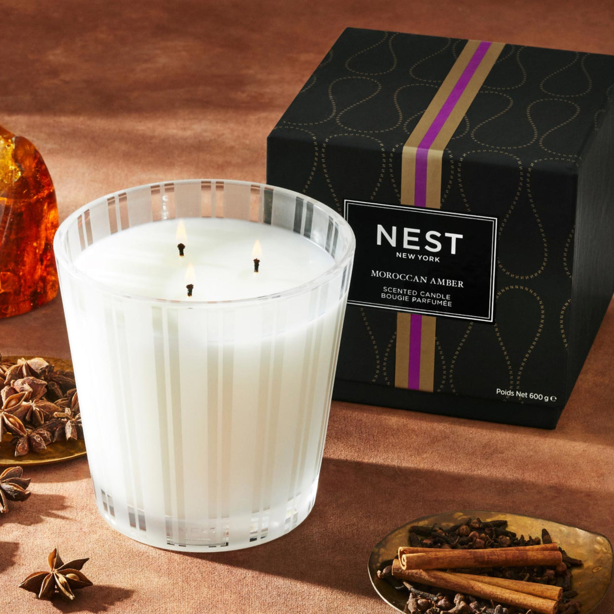 Topview Lifestyle Photo of Nest New York’s Moroccan Amber 3-Wick Candle