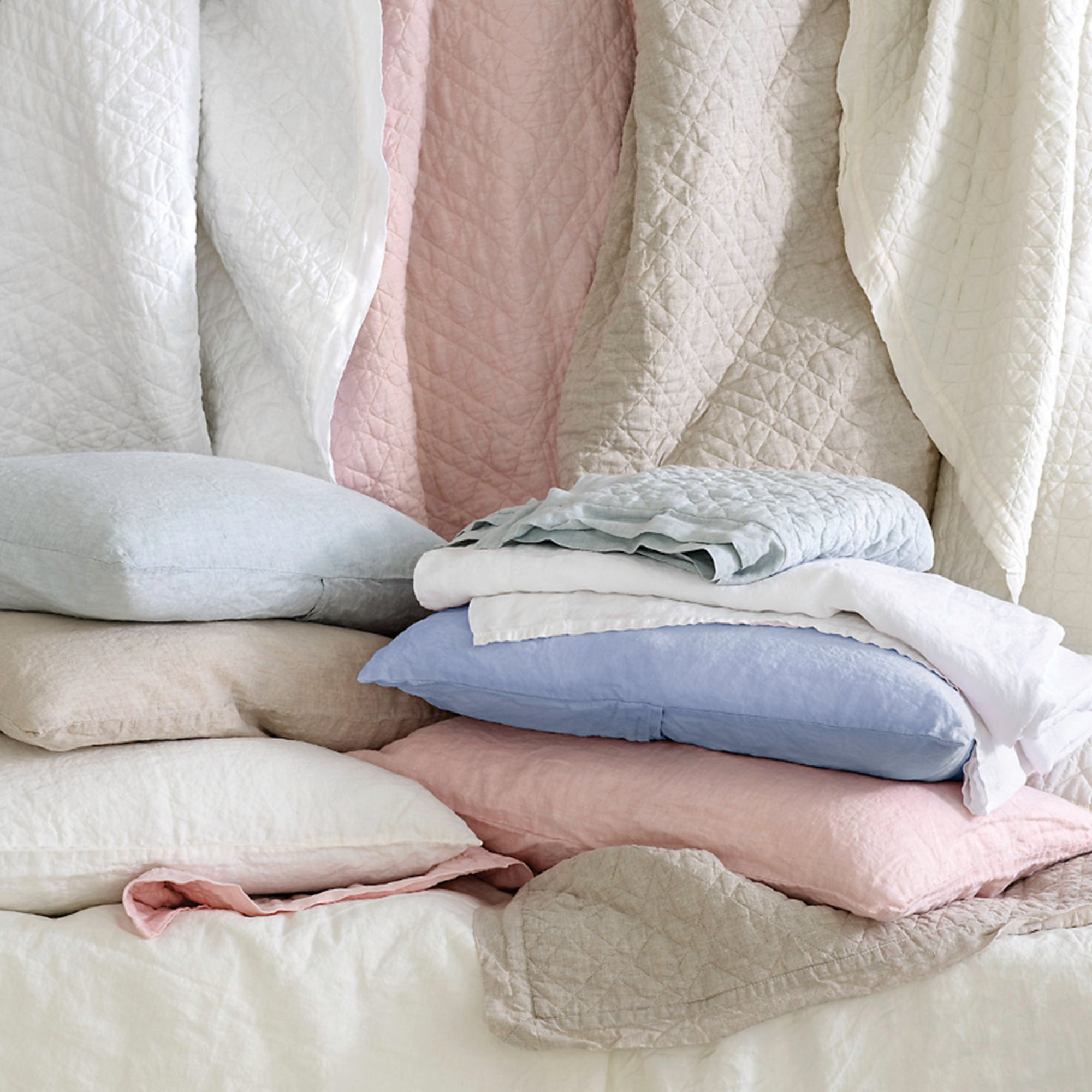 Stack Image of Pine Cone Hill Washed Linen Quilted Bedding in Different Colors