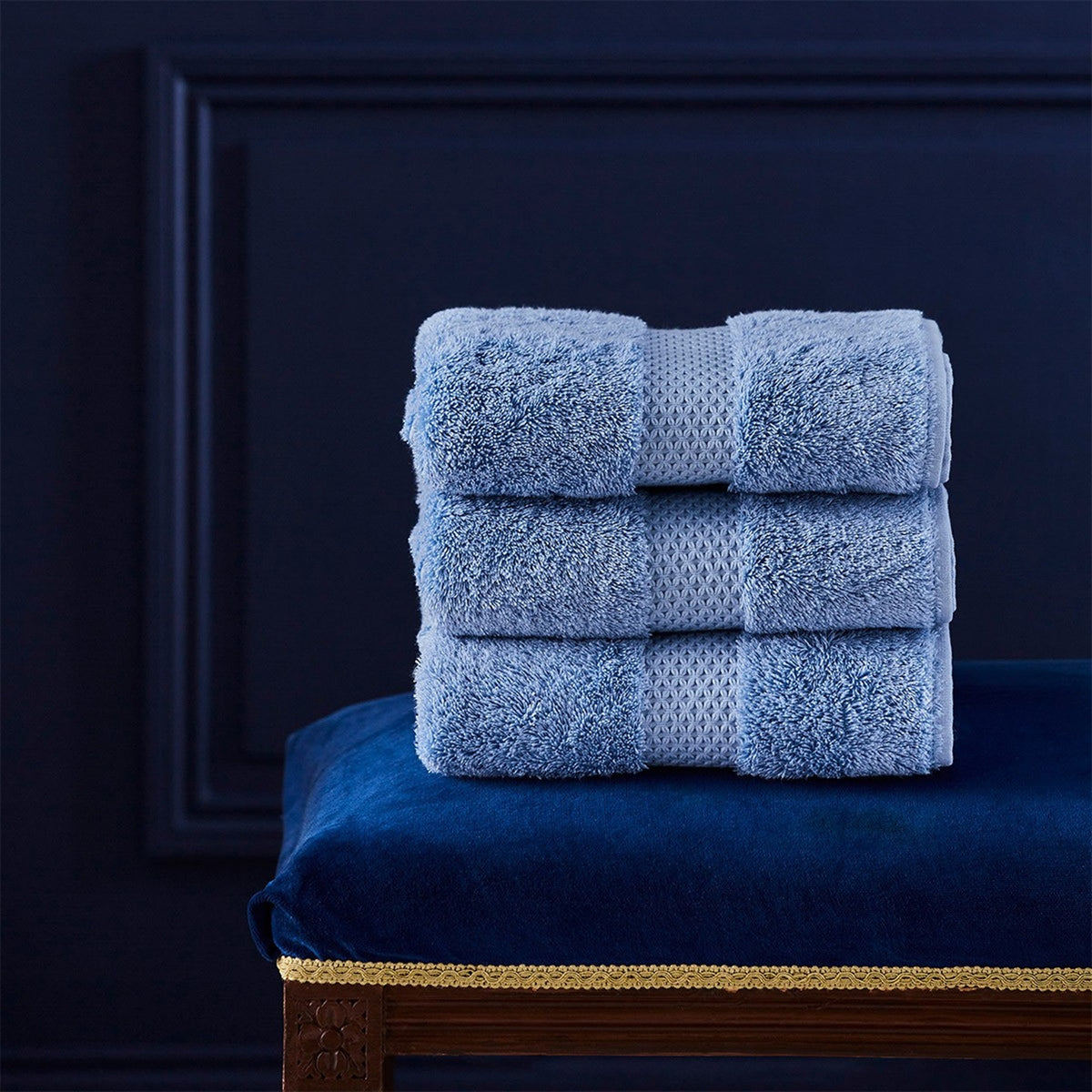 Lifestyle Shot of Yves Delorme Etoile Bath Towels and Mats in Azure Color