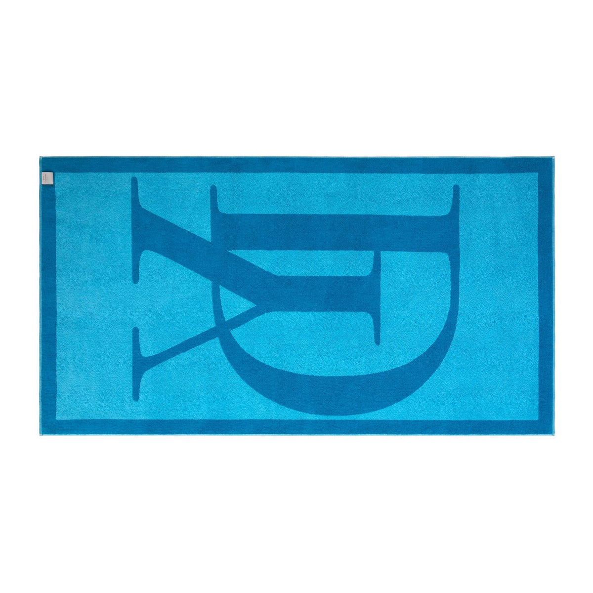 Back View of Yves Delorme Griffe Beach Towel in Jacuzzi Color