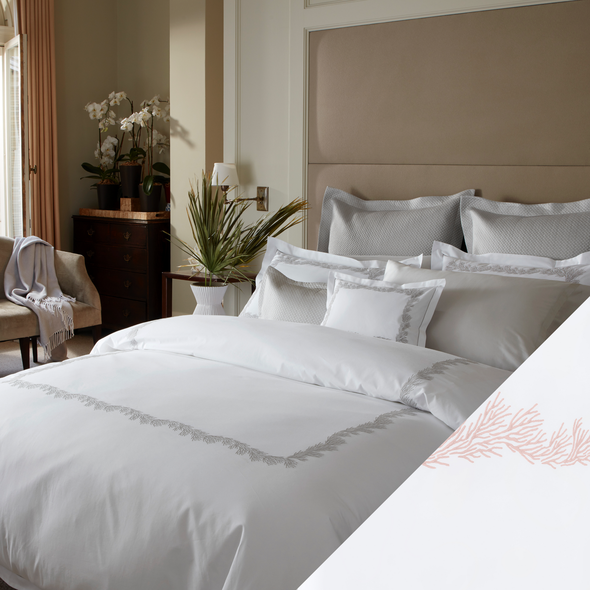 Full Lifestyle Image of Matouk Atoll Bedding Collection with Swatch of Blush