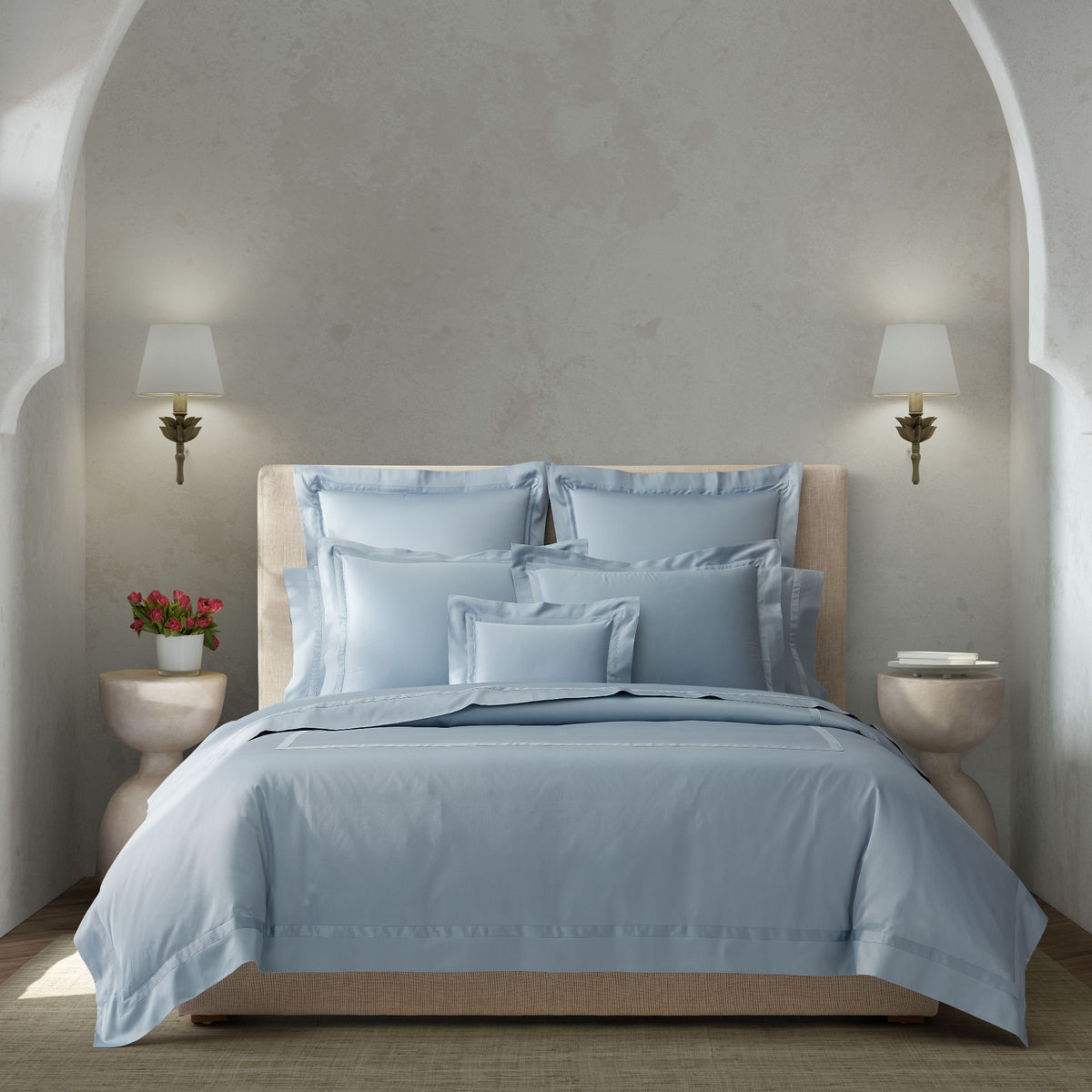 Full Bedding Dressed in Matouk Nocturne Collection Hazy Blue Color