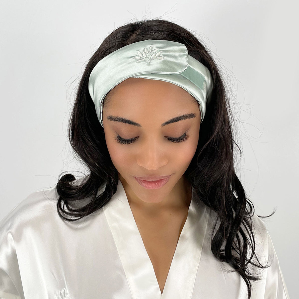 Woman wearing a Sage Silk Glam Band from Mulberry Park Silks