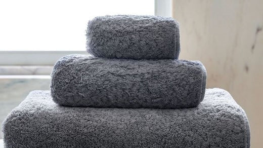 The Towels of Portugal: A Legacy of Artistry and Innovation Folded Stacked Window Bathroom