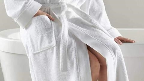 Give her a cozy robe with Pocket for Mother's Day Woman Sitting on Bathtub
