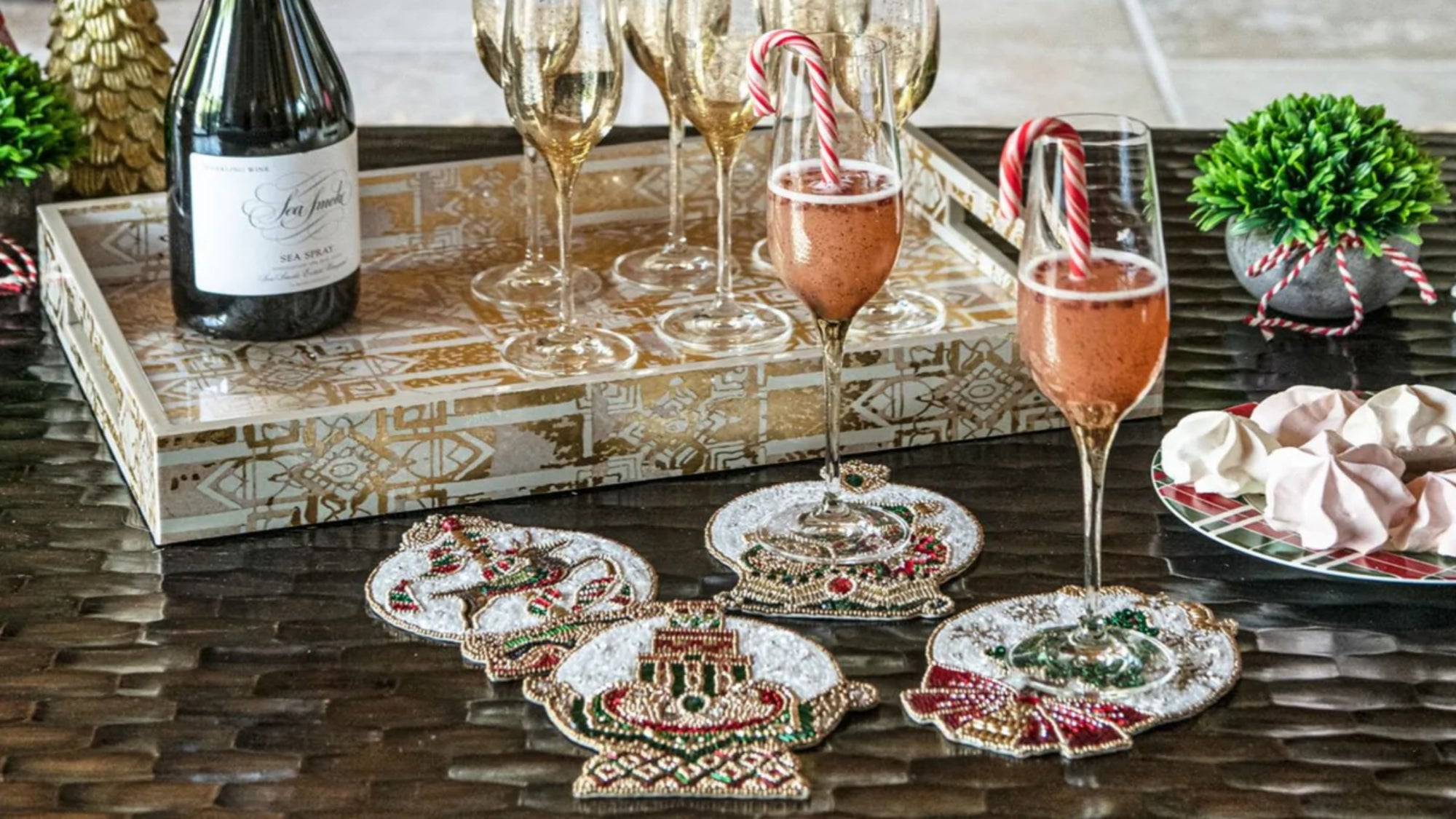 Wines glasses on Christmas styled coasters