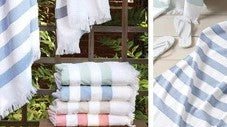 Luxury Beach Towel Buyer's Guide Stripe Towels Fine Linens Folded and Hung