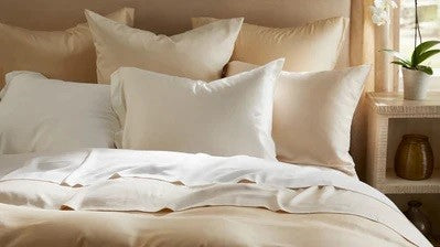 Legna Linens from SDH: Sustainable Beauty for Bed and Bath Pillows Fine Linens Bedding on Bed 