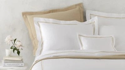 How to Make a Perfect Bed: A Complete Guide to Bedding Essentials Pillows Fine Linens Nightstand with Flowers