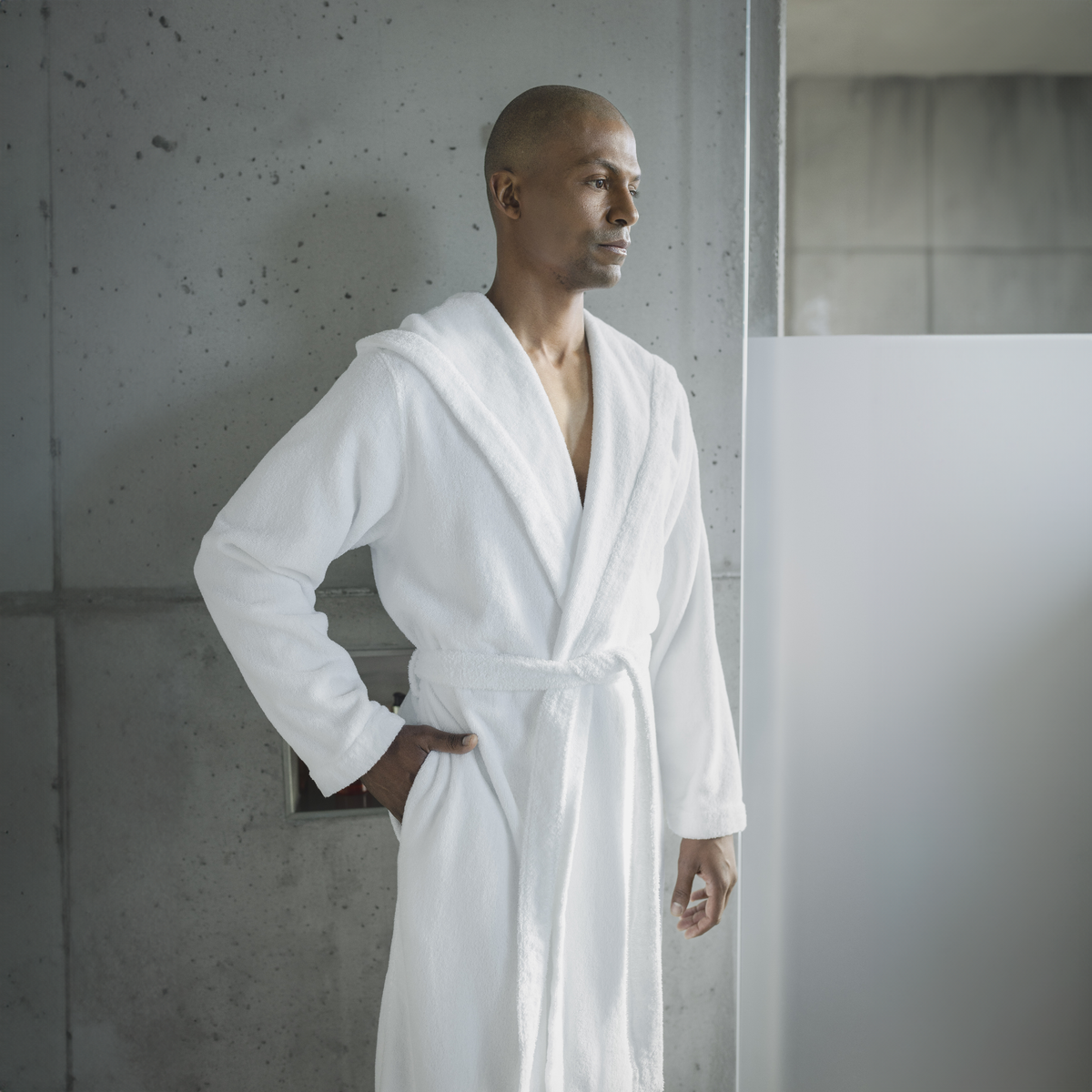 Lifestyle Shot of Male Model Wearing Abyss Alex Bath Robes in White Color