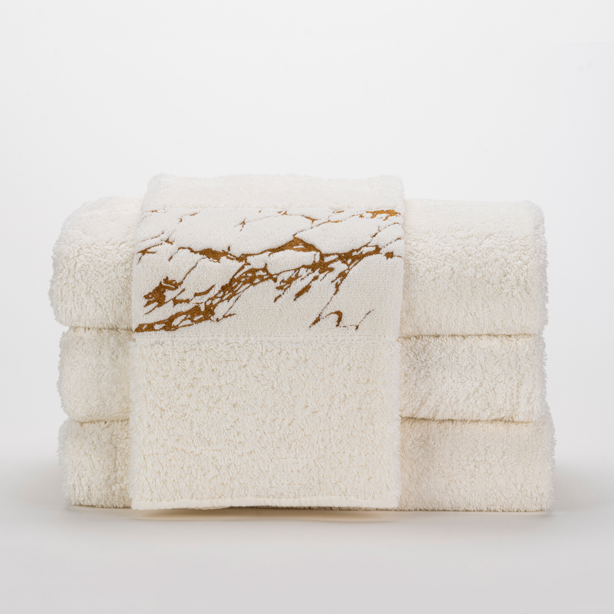Stack of Abyss Alpi Hand Towels in Gold Color