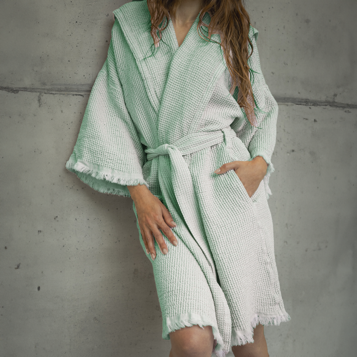 Lifestyle Closeup of Abyss Bees Bath Robe in Aqua Color