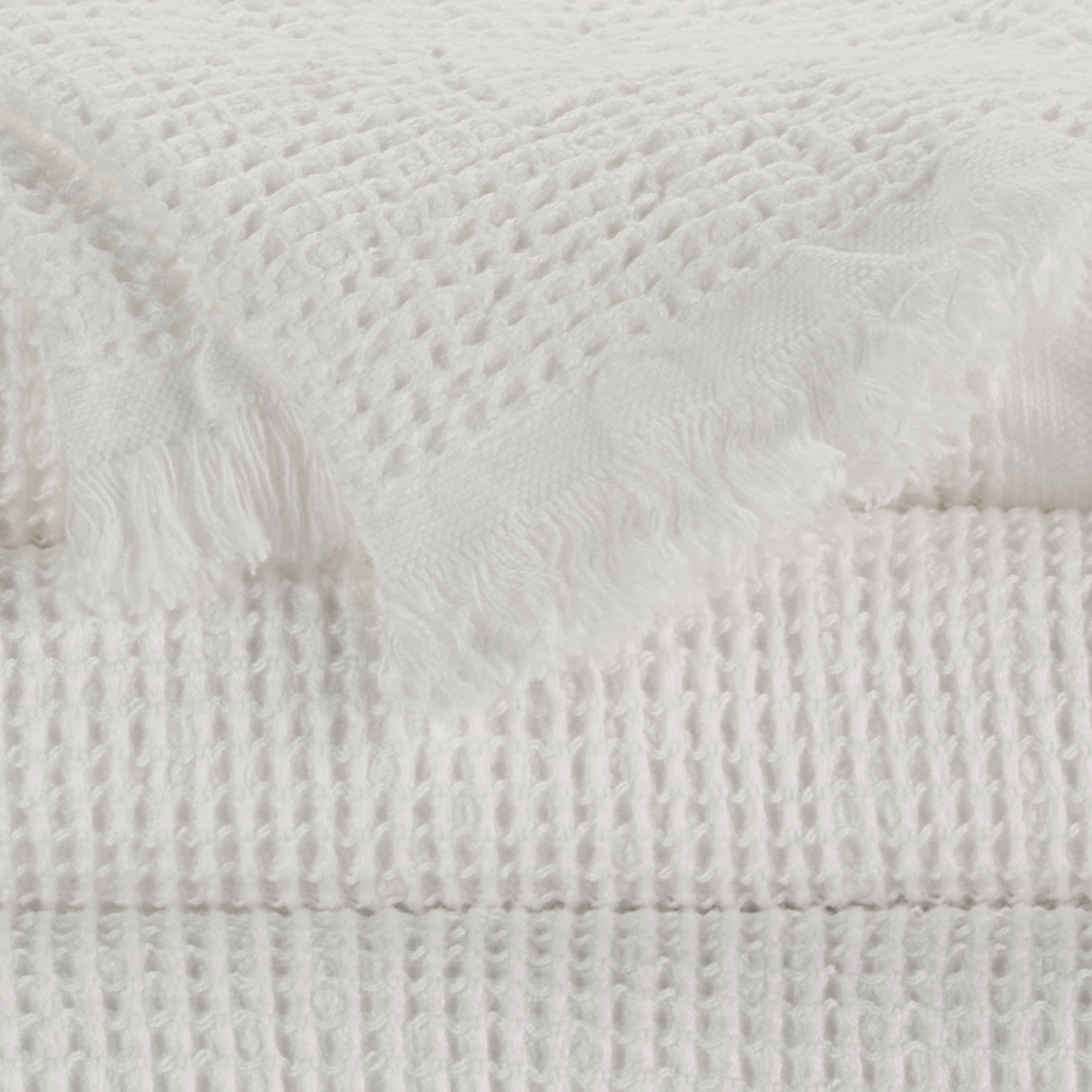 Tilted View of Abyss Bees Bath Towels in White (100) Color