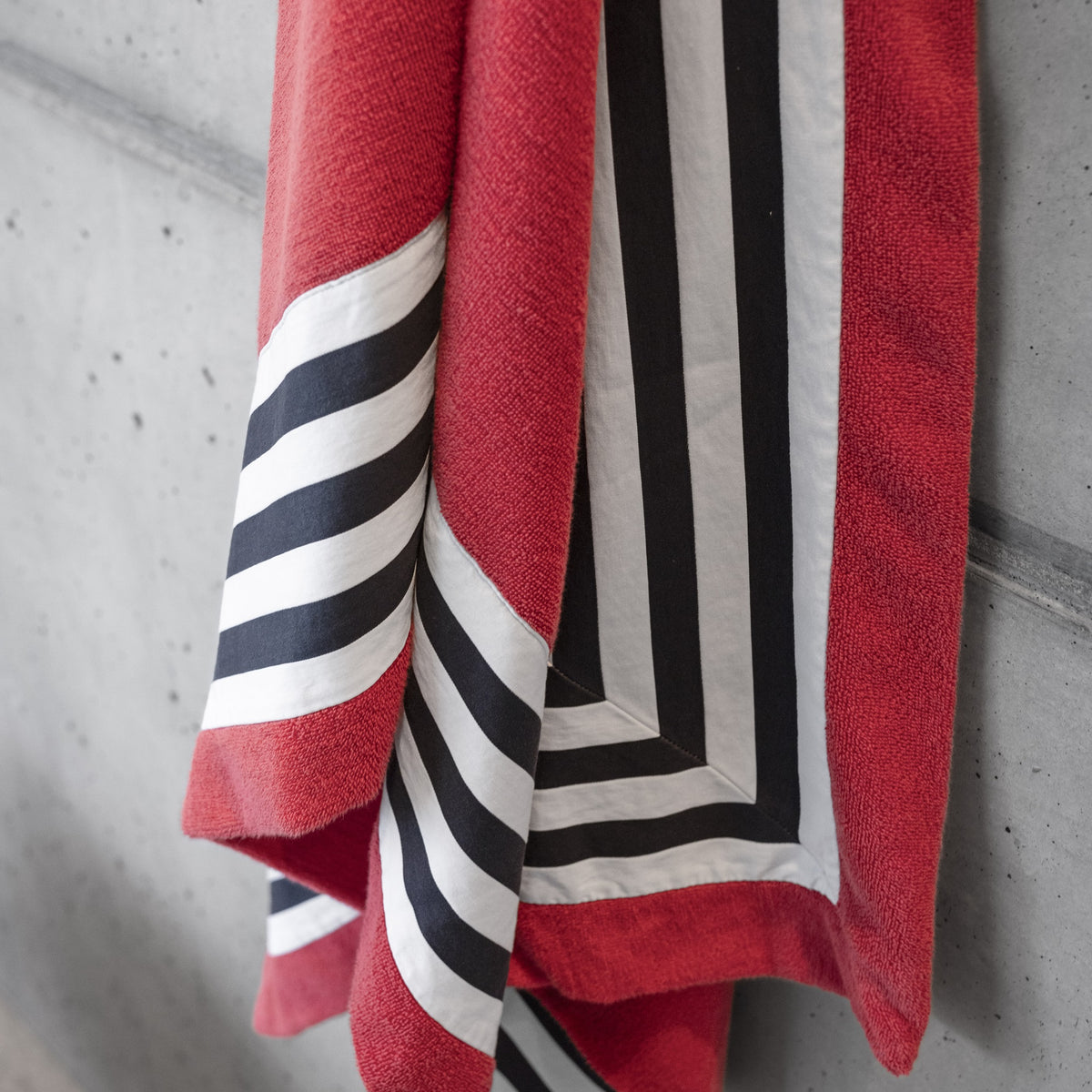 Detailed Shot of Abyss Cannes Beach Towels in Color Viva Magenta (579)
