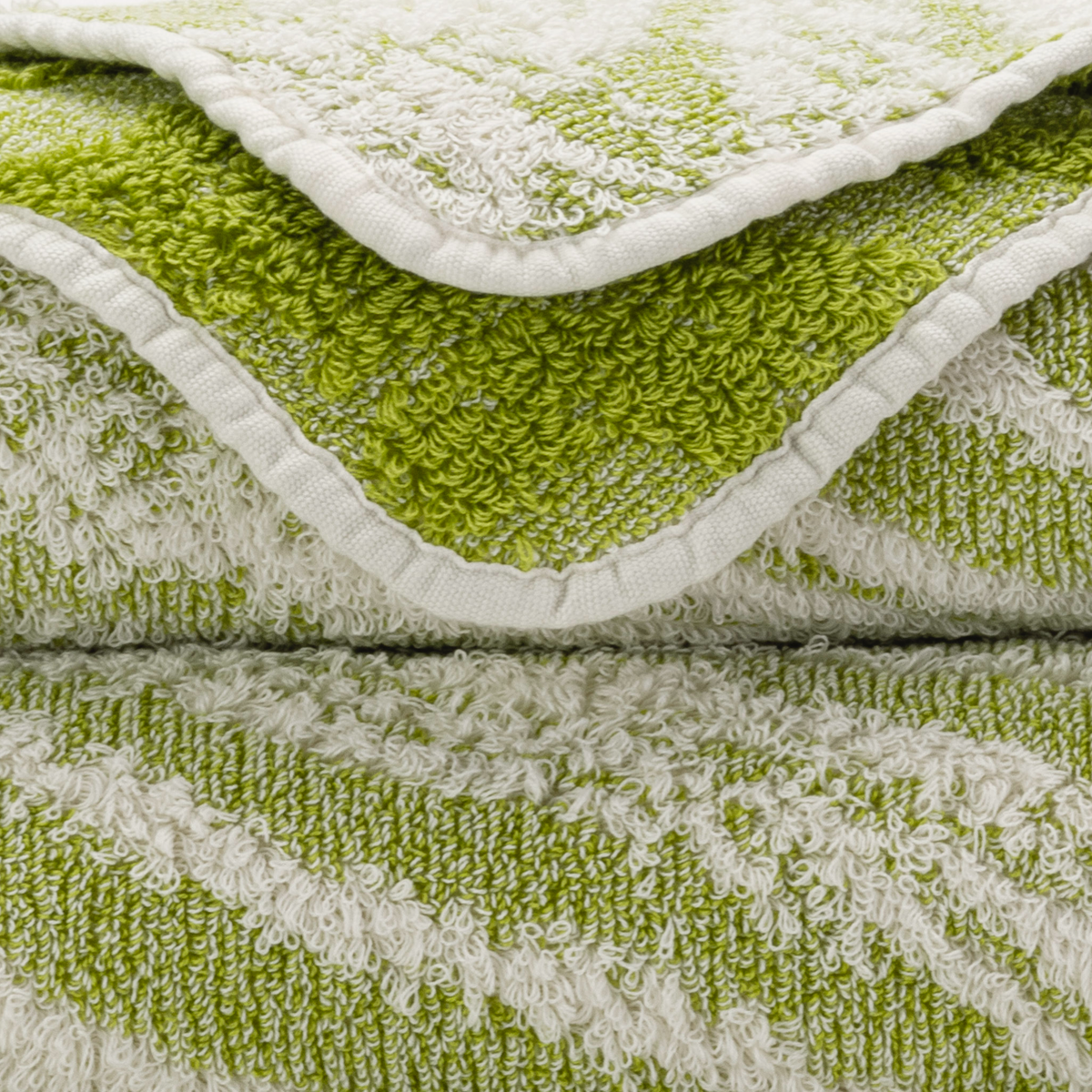 Closeup of Abyss Fogo Bath Towels in Apple Green Color