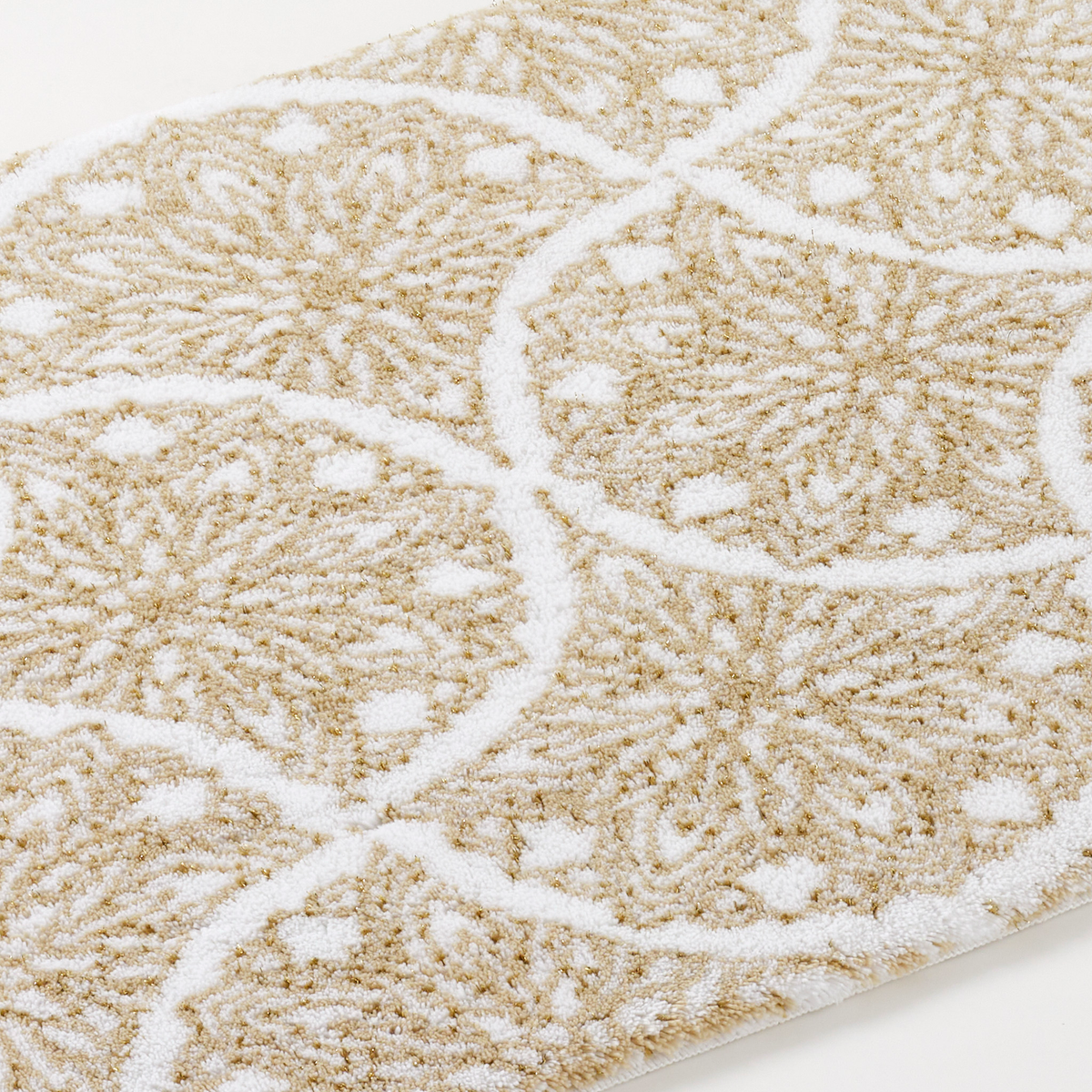 Closeup of Sand color Abyss Habidecor Alambra Bath Rug