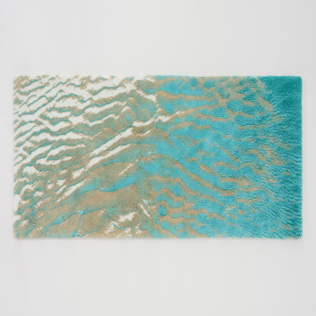 Turquoise colored Abyss Habidecor Beach Bath Rug