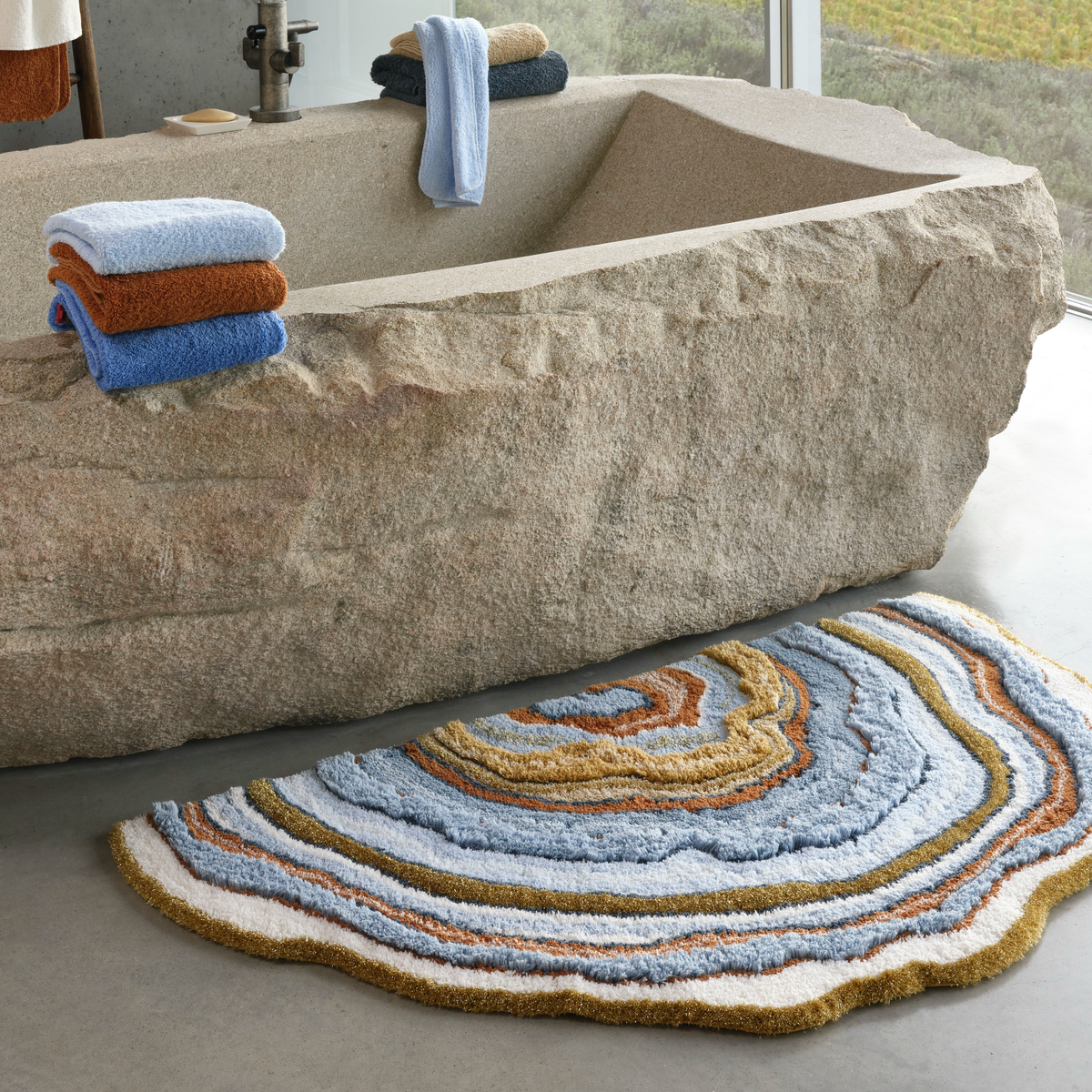 Powder Blue colored Abyss Habidecor Celora Bath Rug with matching towels