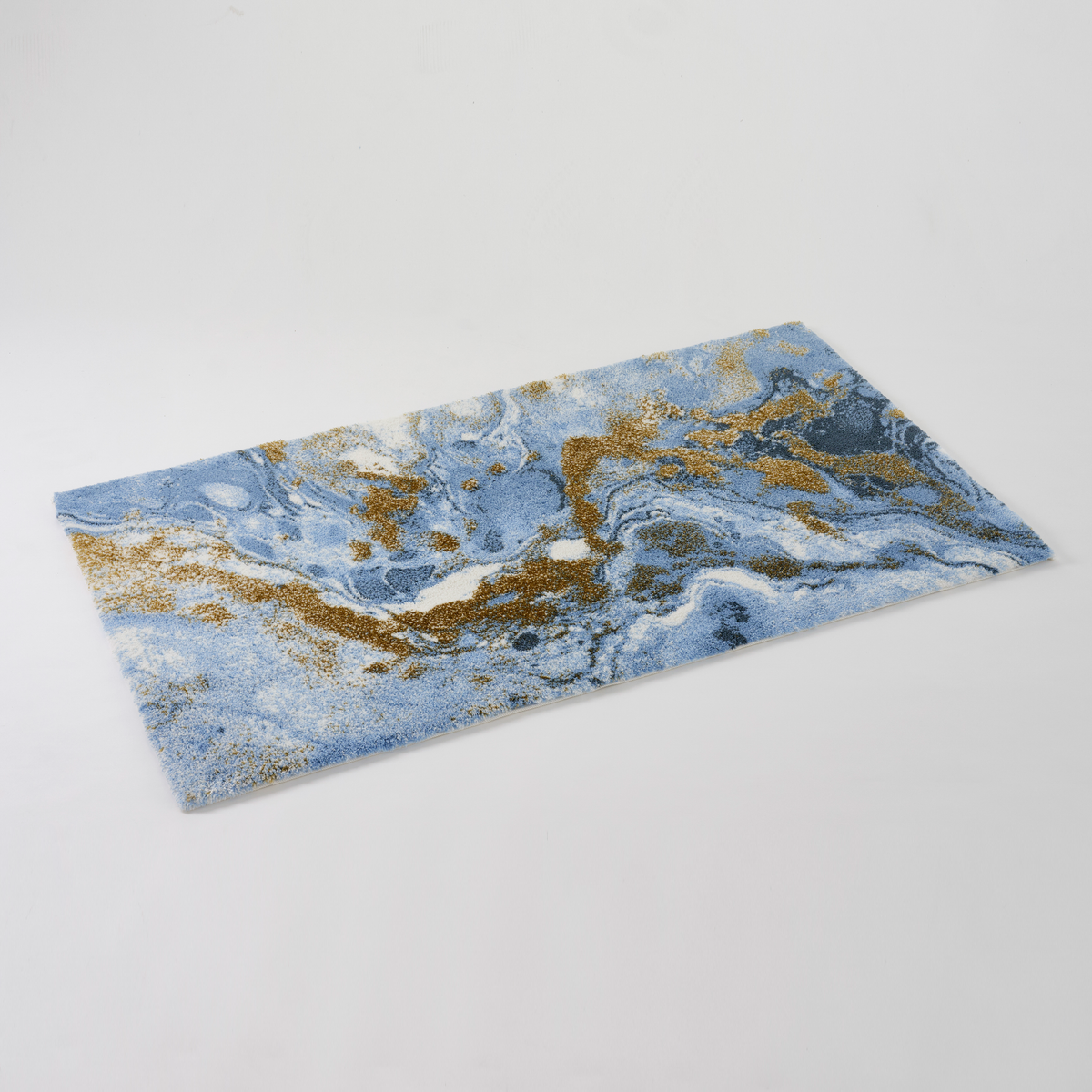 Angled view of Powder Blue colored Abyss Habidecor Dandy Bath Rug