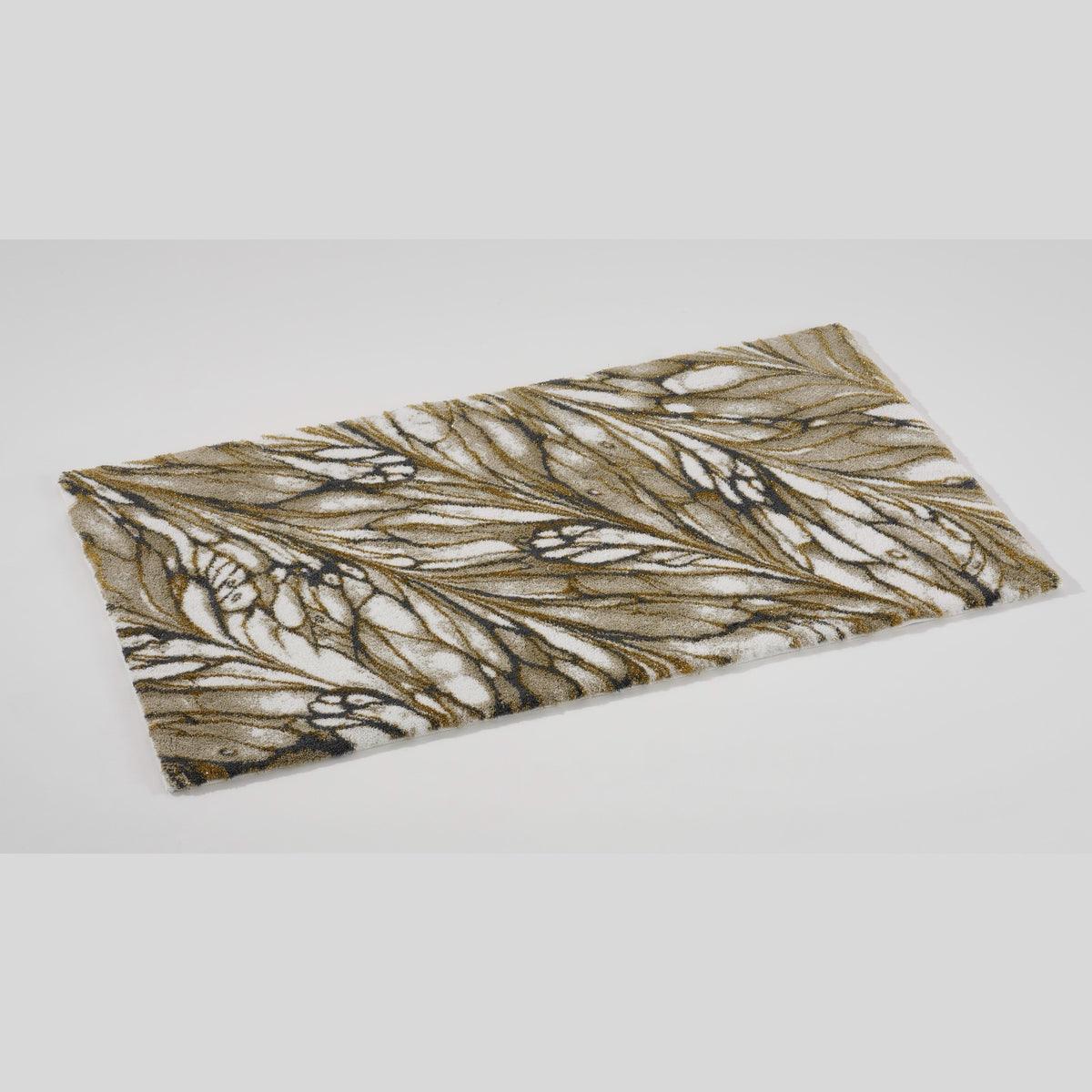 Angled View of Gold Abyss Habidecor Diane Bath Rug