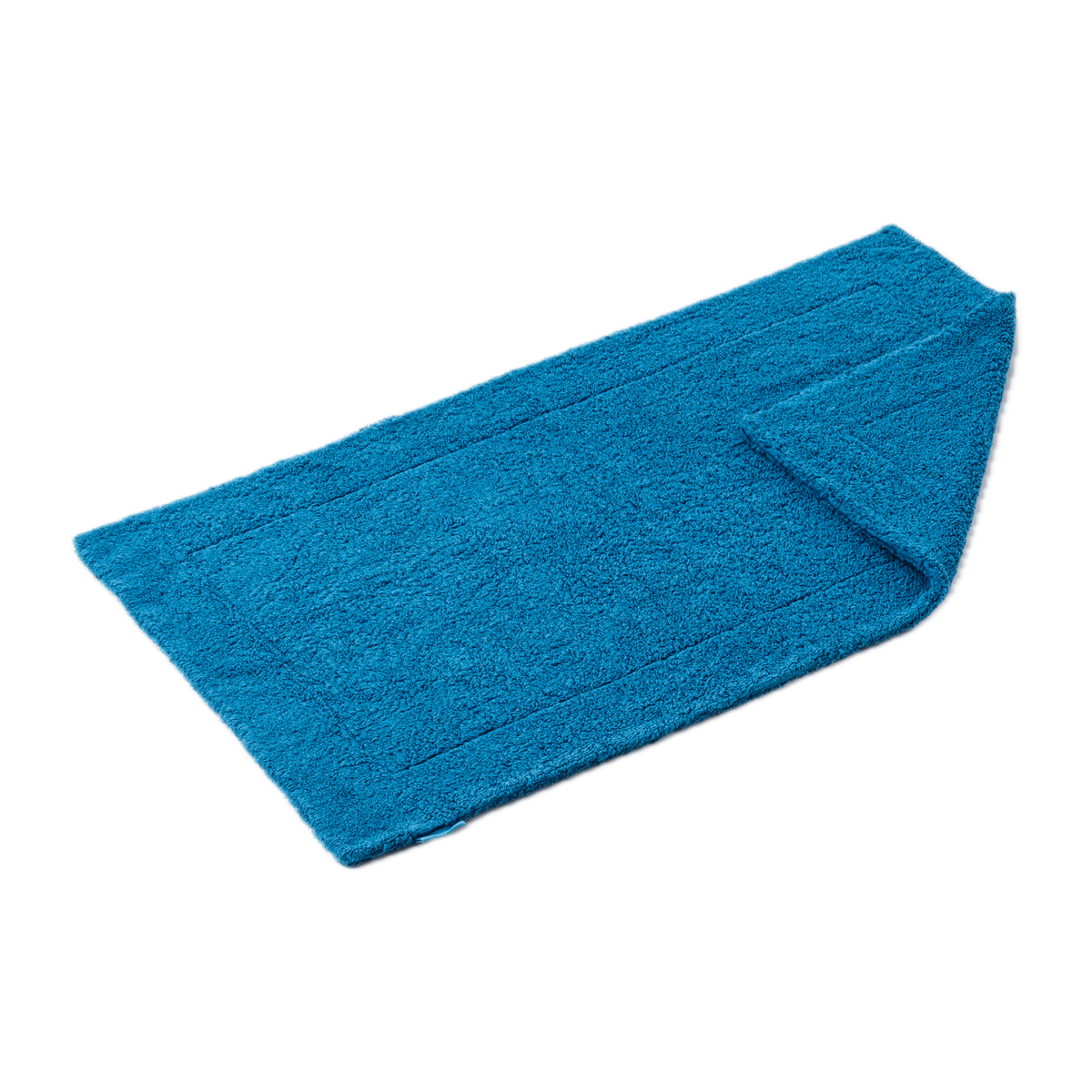 Slanted Image of Abyss Double Bath Tub Mat in Ocean (336) Color with Fold