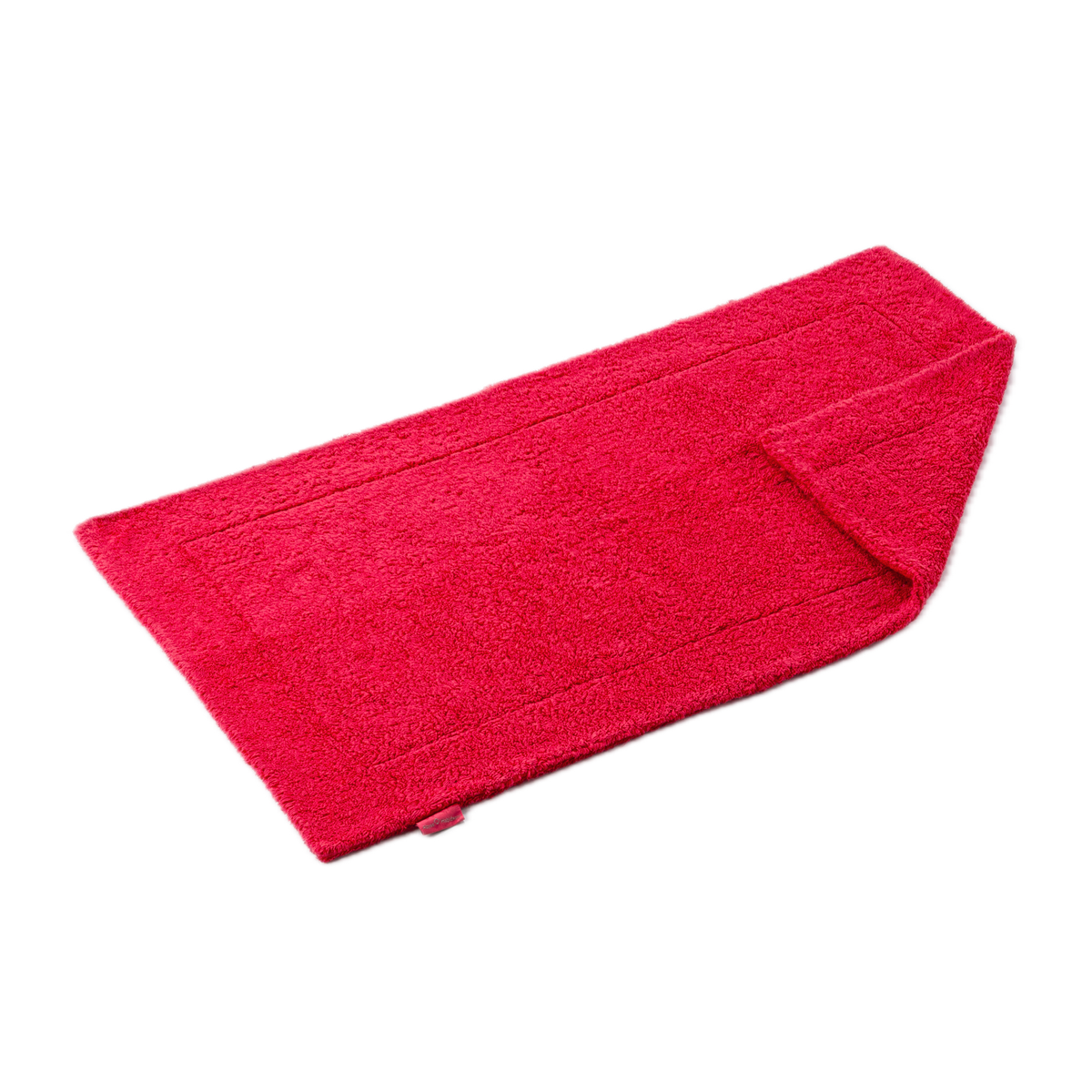 Slanted Image of Abyss Double Bath Tub Mat in Viva Magenta (579) Color with Fold