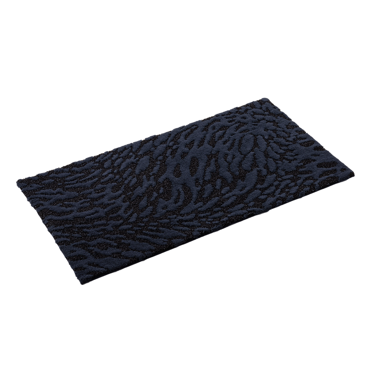 Slant Image of Abyss Habidecor Flow Bath Rugs in Color Black (990)
