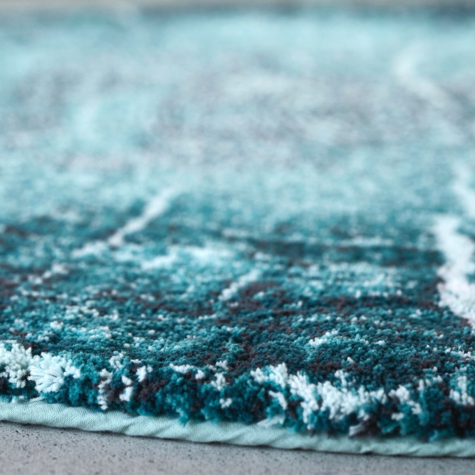 Dragonfly Abyss Habidecor Fossile Bath Rug on the floor