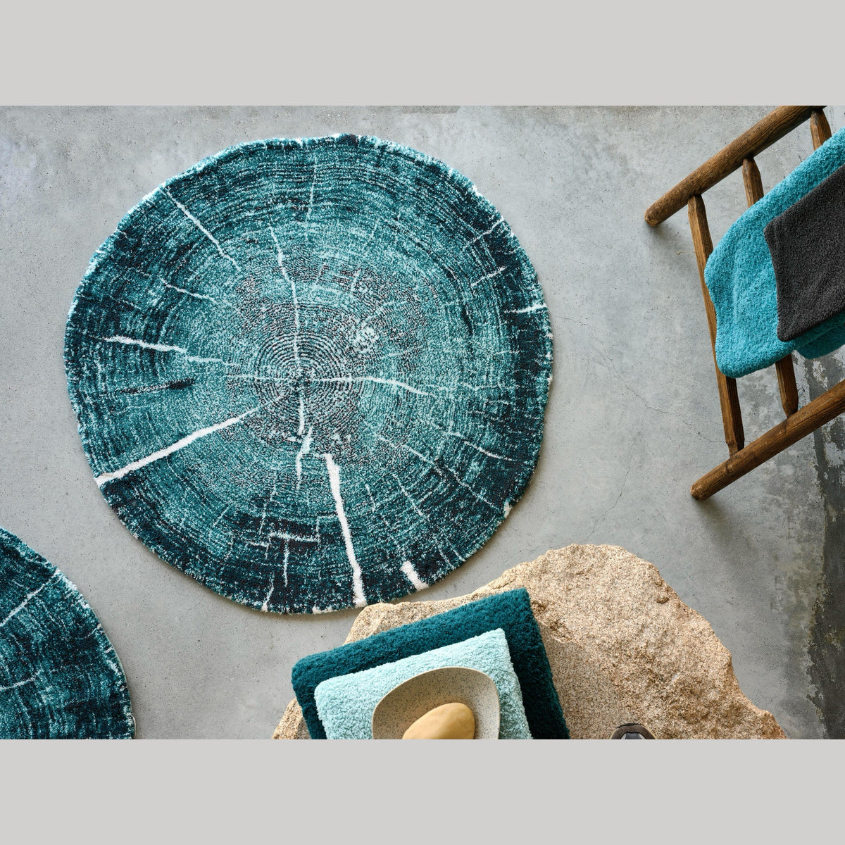 Dragonfly Abyss Habidecor Fossile Bath Rug on the floor