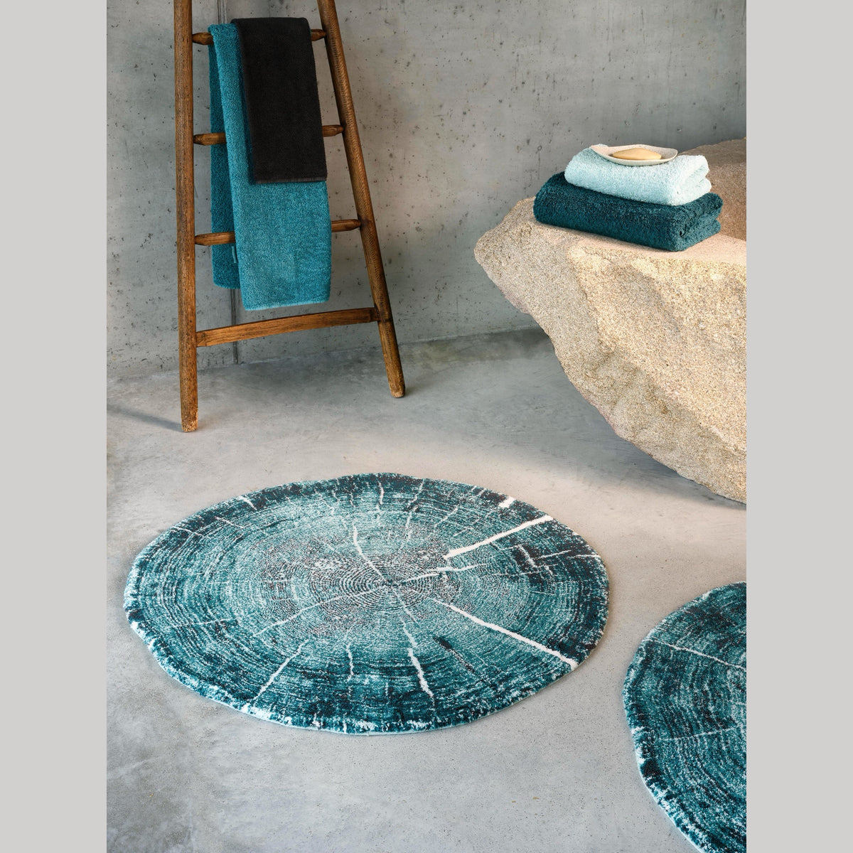 Dragonfly Abyss Habidecor Fossile Bath Rug with color coordinate bath linens