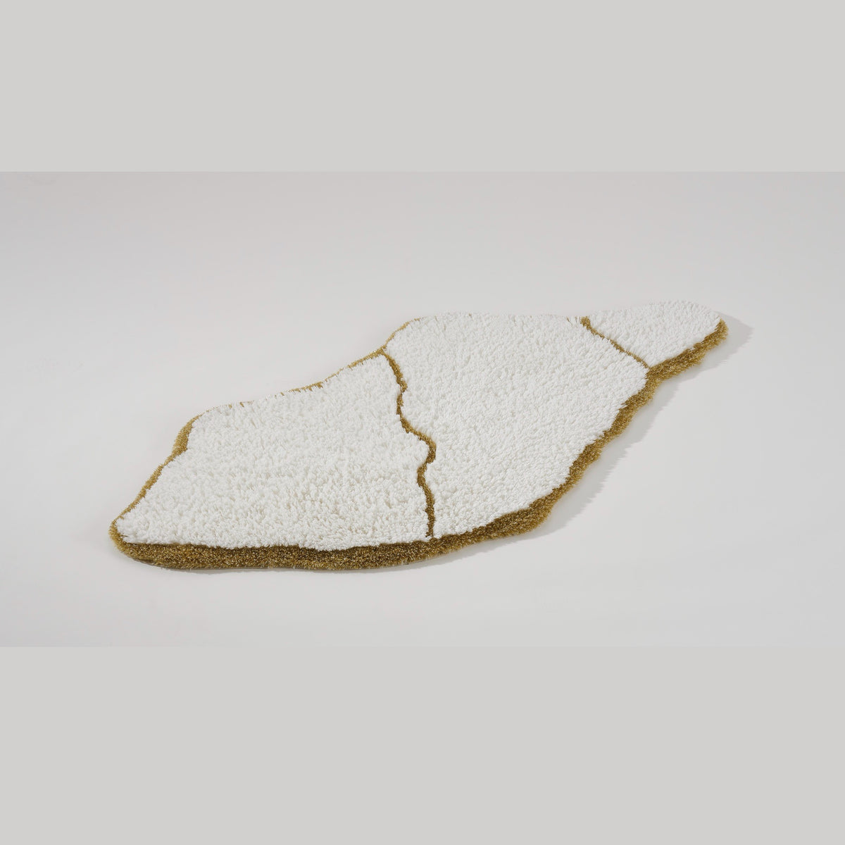 Angled View of Gold (800) Abyss Habidecor Jess Bath Rug