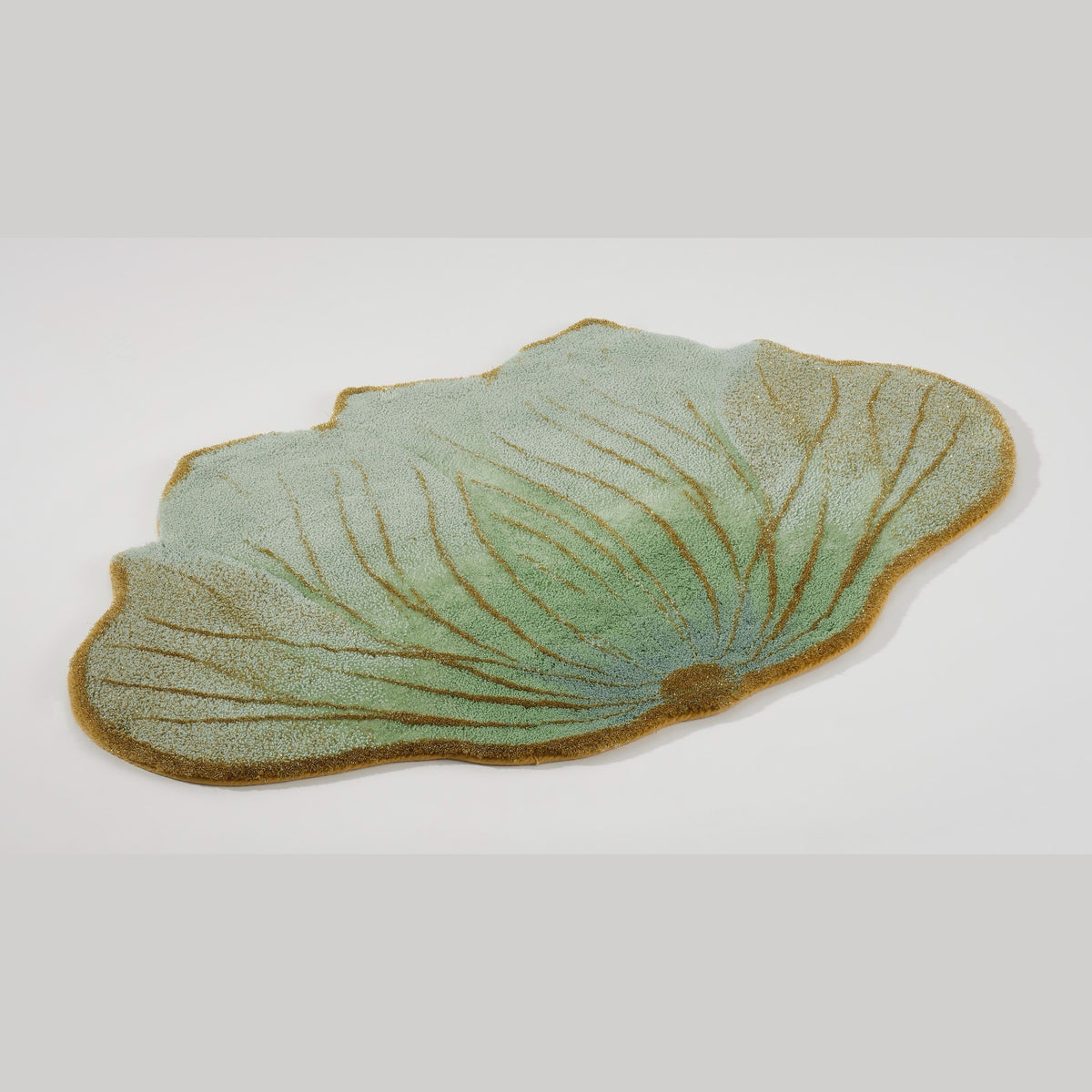 Angled View of Aqua (210) Abyss Habidecor Lotus Bath Rug