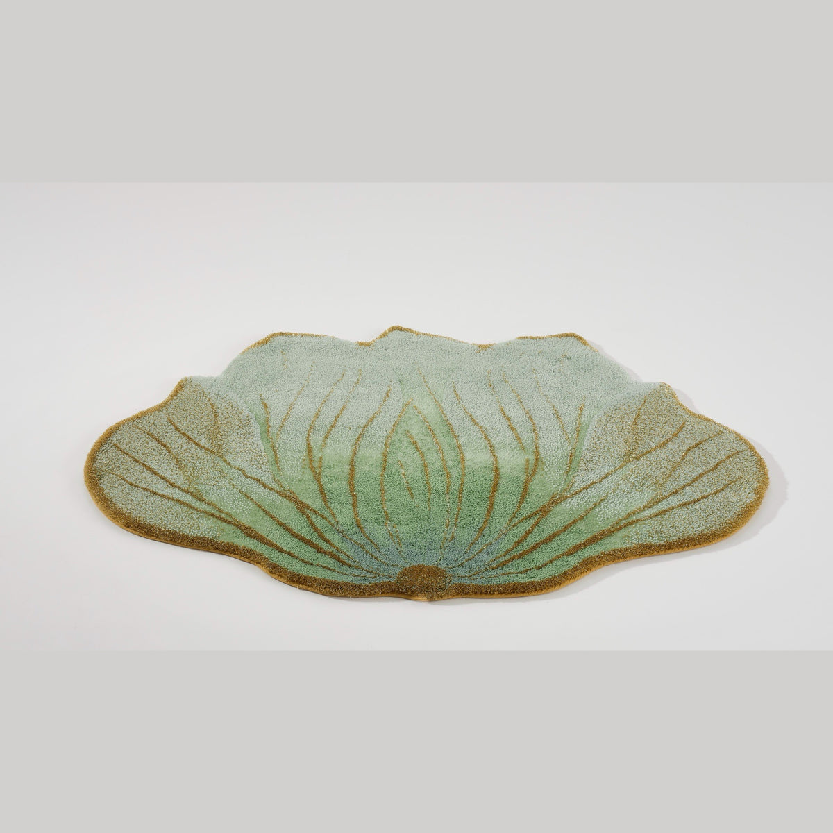 Tilted View of Aqua (210) Abyss Habidecor Lotus Bath Rug