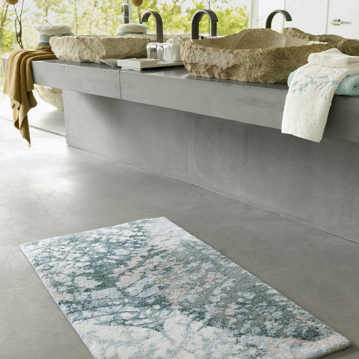 Lifestyle Shot of Abyss Habidecor Monoke Bath Rug in Color Aqua (210)