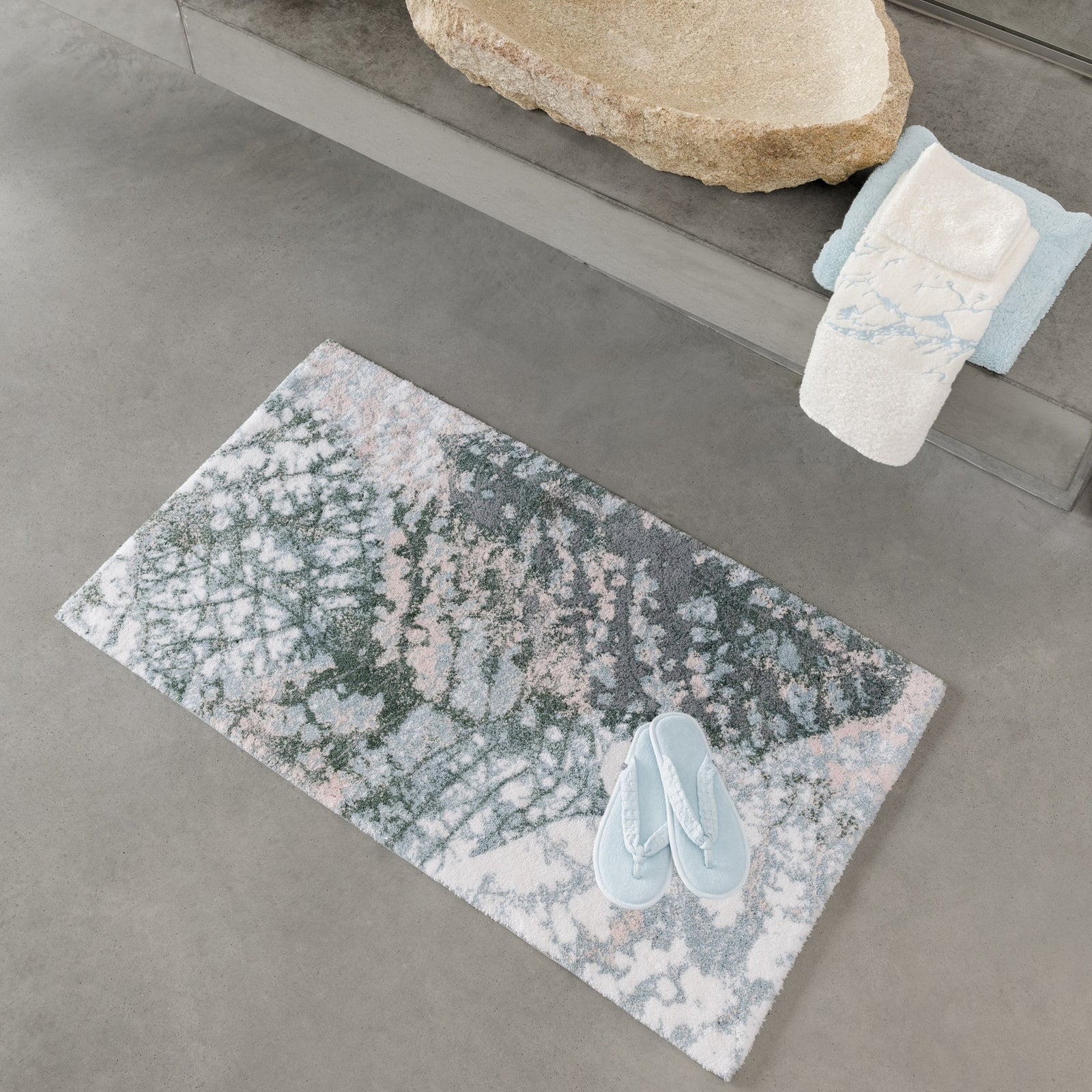 Aqua Abyss Habidecor Monoke Bath Rug on the Floor