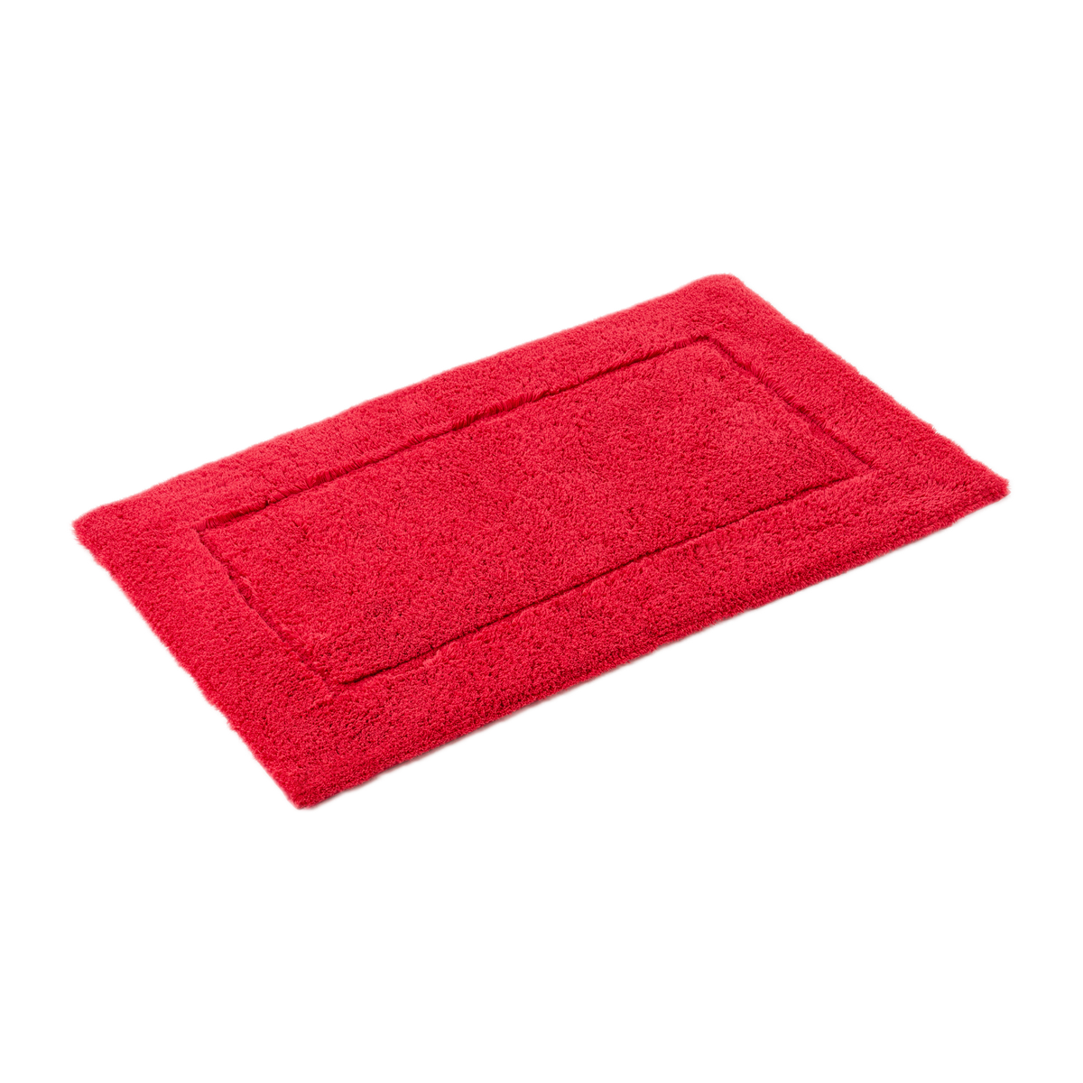 Slanted View of Abyss Habidecor Must Bath Rug in Viva Magenta Color