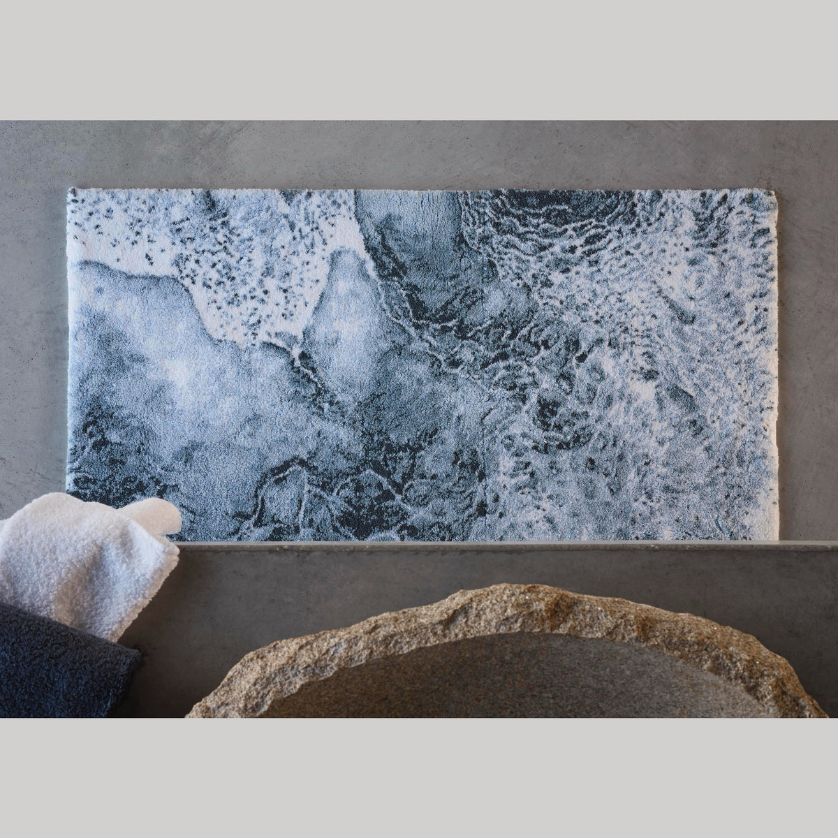 Top view of Denim (307) Abyss Habidecor Nazare Bath Rug on floor