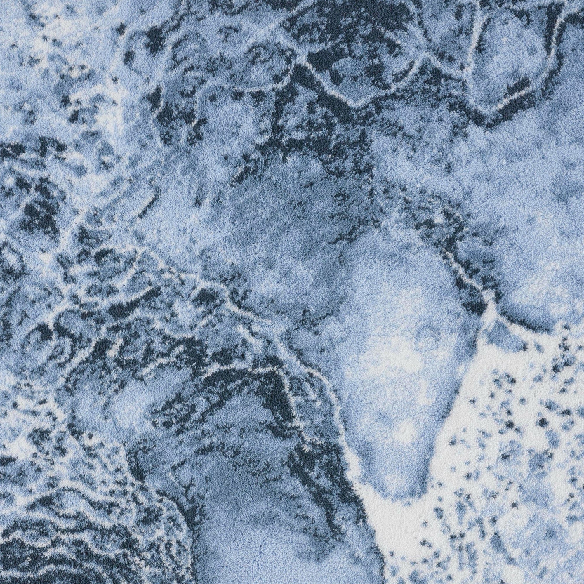 Denim (307) Abyss Habidecor Nazare Bath Rug beneath a lavatory