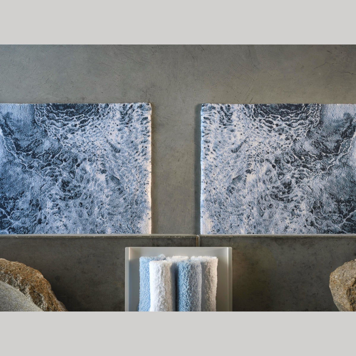 Two Denim (307) Abyss Habidecor Nazare Bath Rug on cement floor