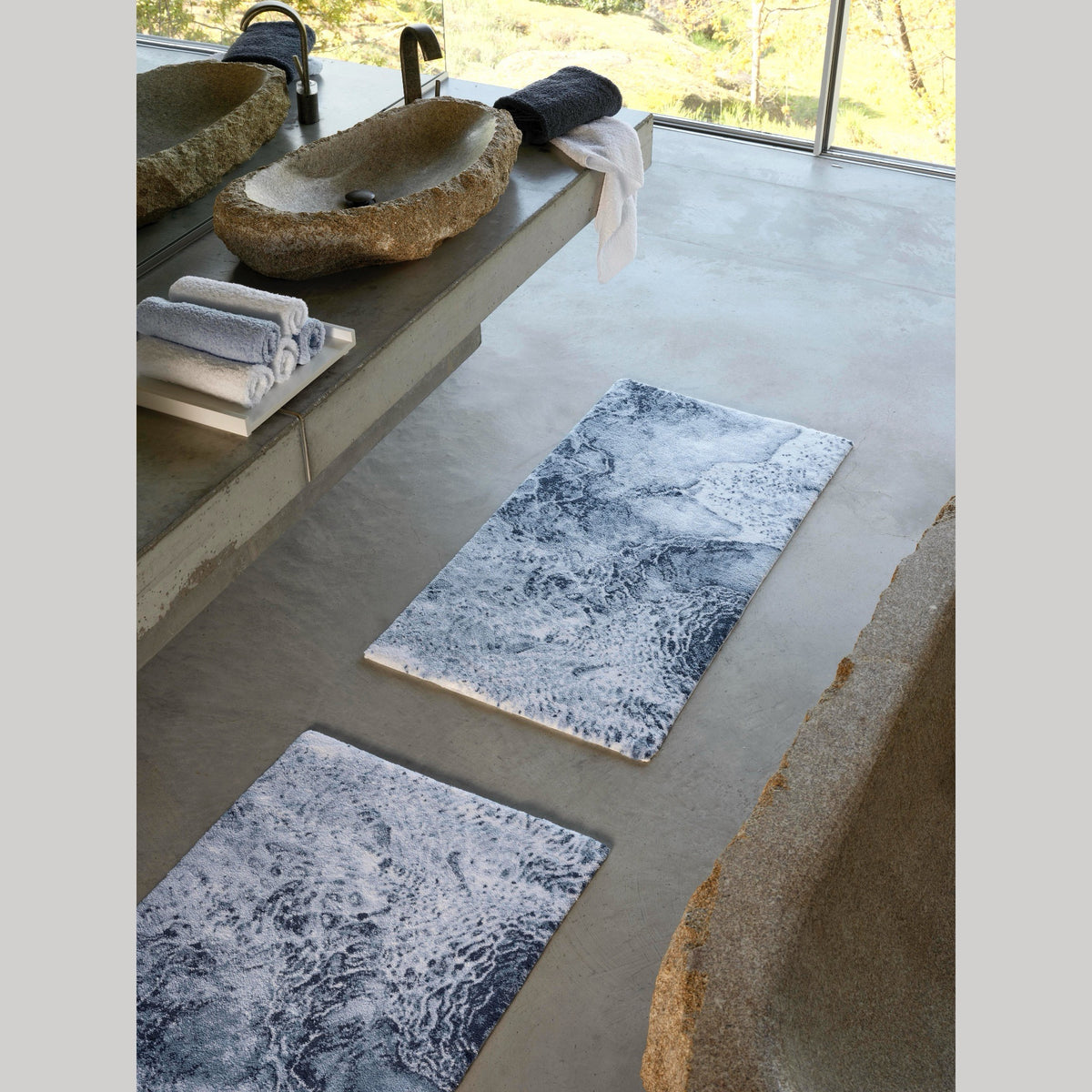 Two Denim (307) Abyss Habidecor Nazare Bath Rug on bathroom floor