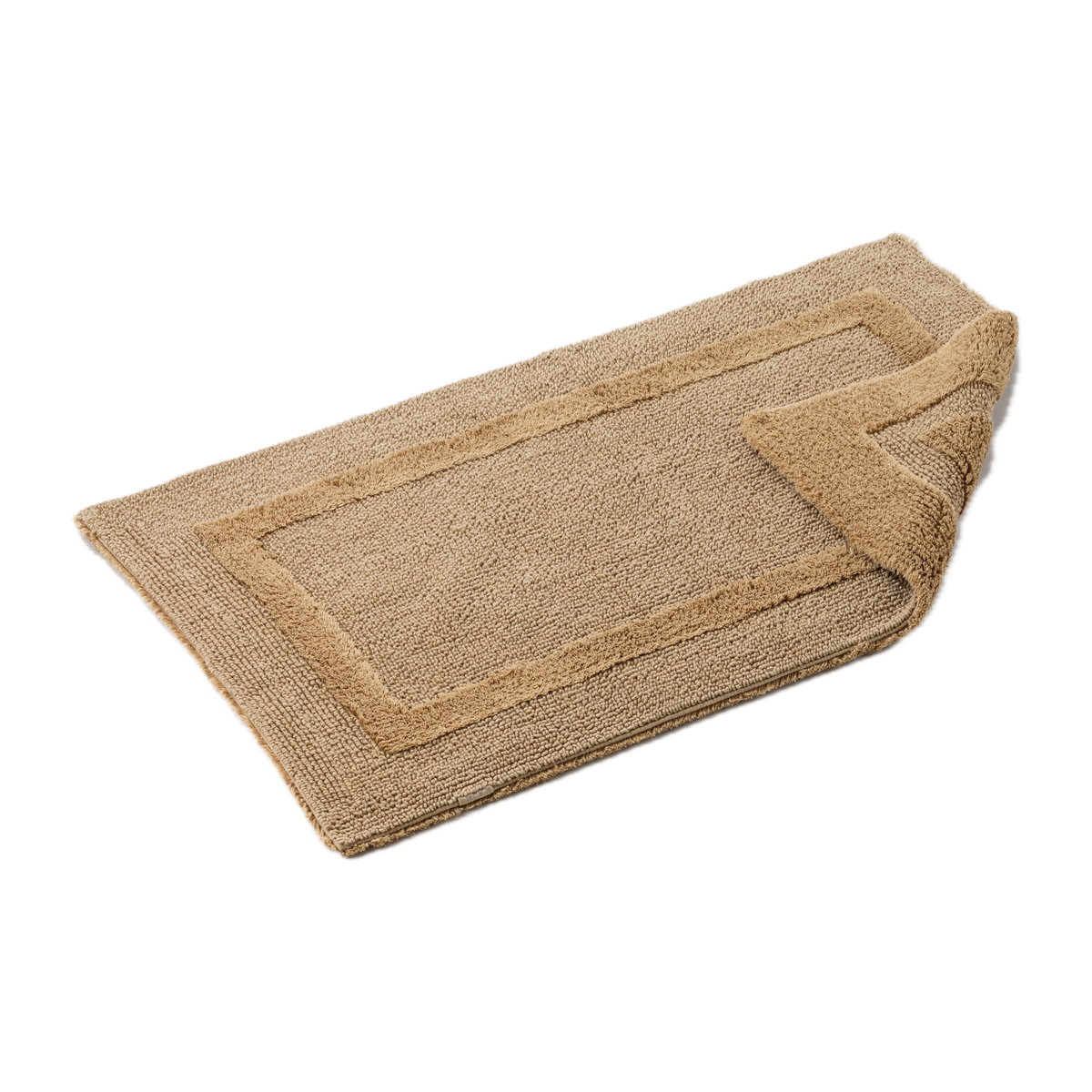 Tilted Image of Abyss Habidecor Reversible Bath Rug in Croissant Color