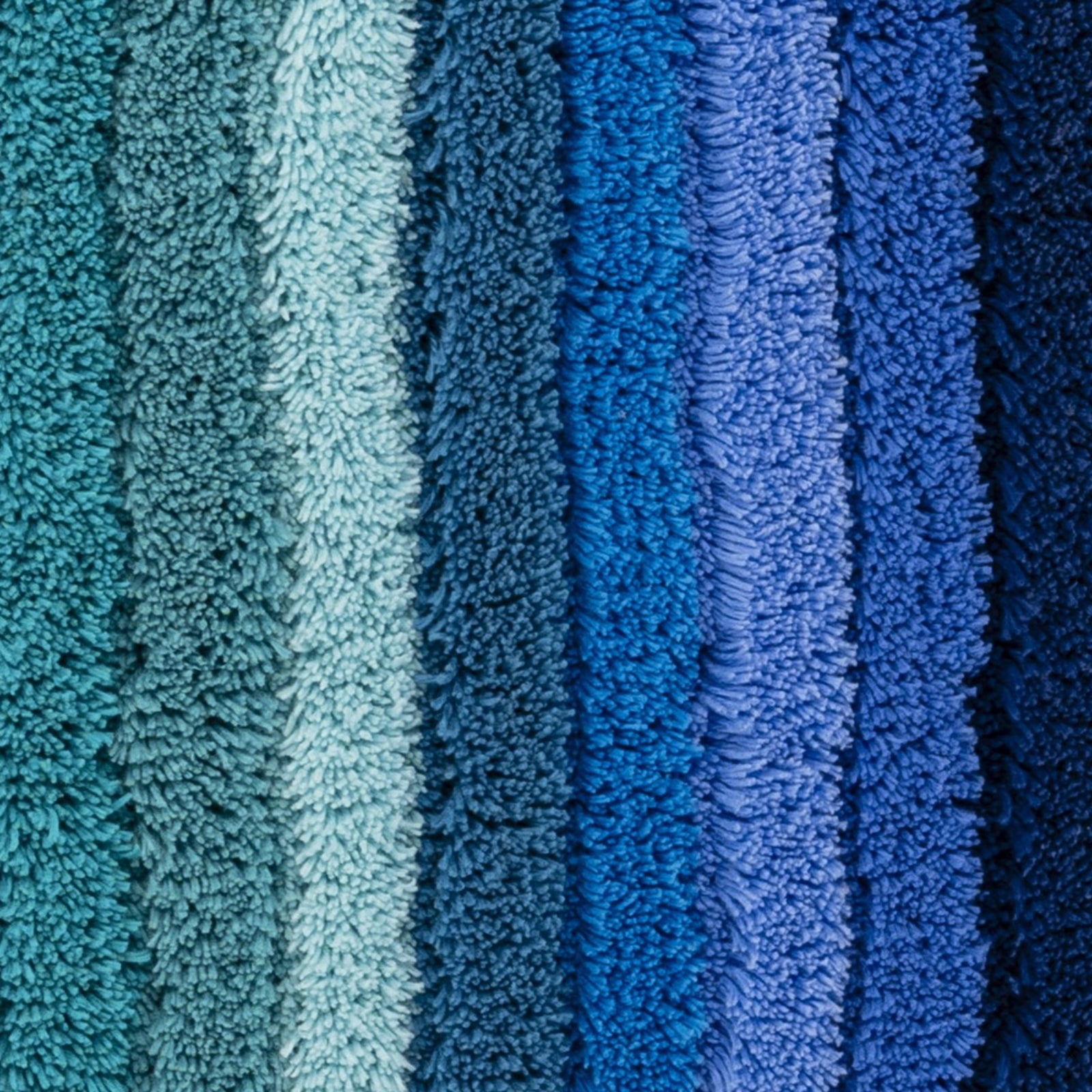 Lifestyle Shot of Abyss Habidecor Santa Cruz Bath Rugs in Color Lagoon (302)