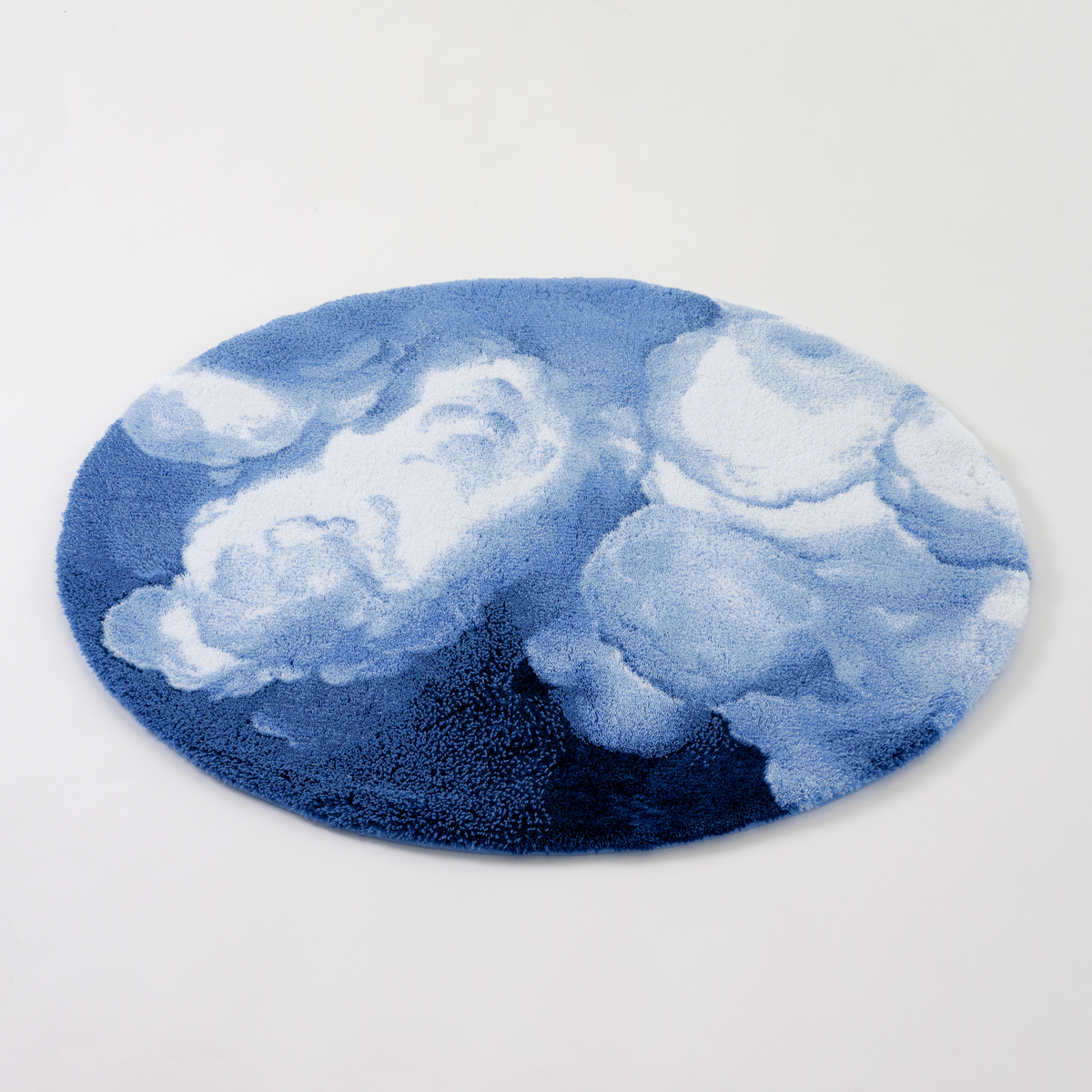 A Regatta colored Abyss Habidecor Walker Bath Rug is displayed on a plain white background
