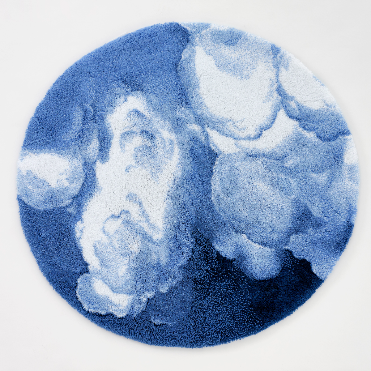 Abyss Habidecor Walker Bath Rug features a blue and white sky pattern, crafted from plush Egyptian cotton