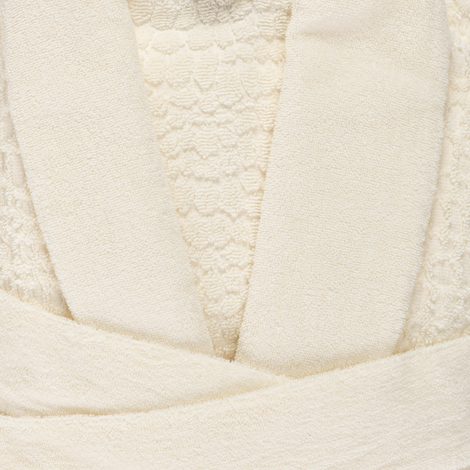 Side view of Model Wearing Abyss Lodge Bath Robe in Ivory Color