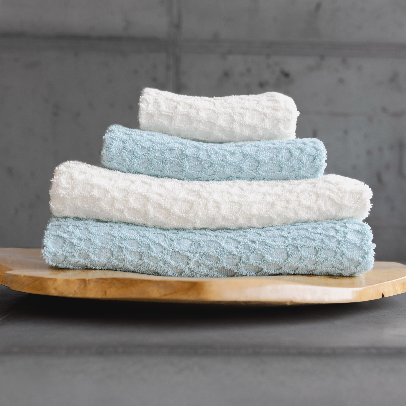 Stack of Abyss Lodge Bath Towels in Both Colors