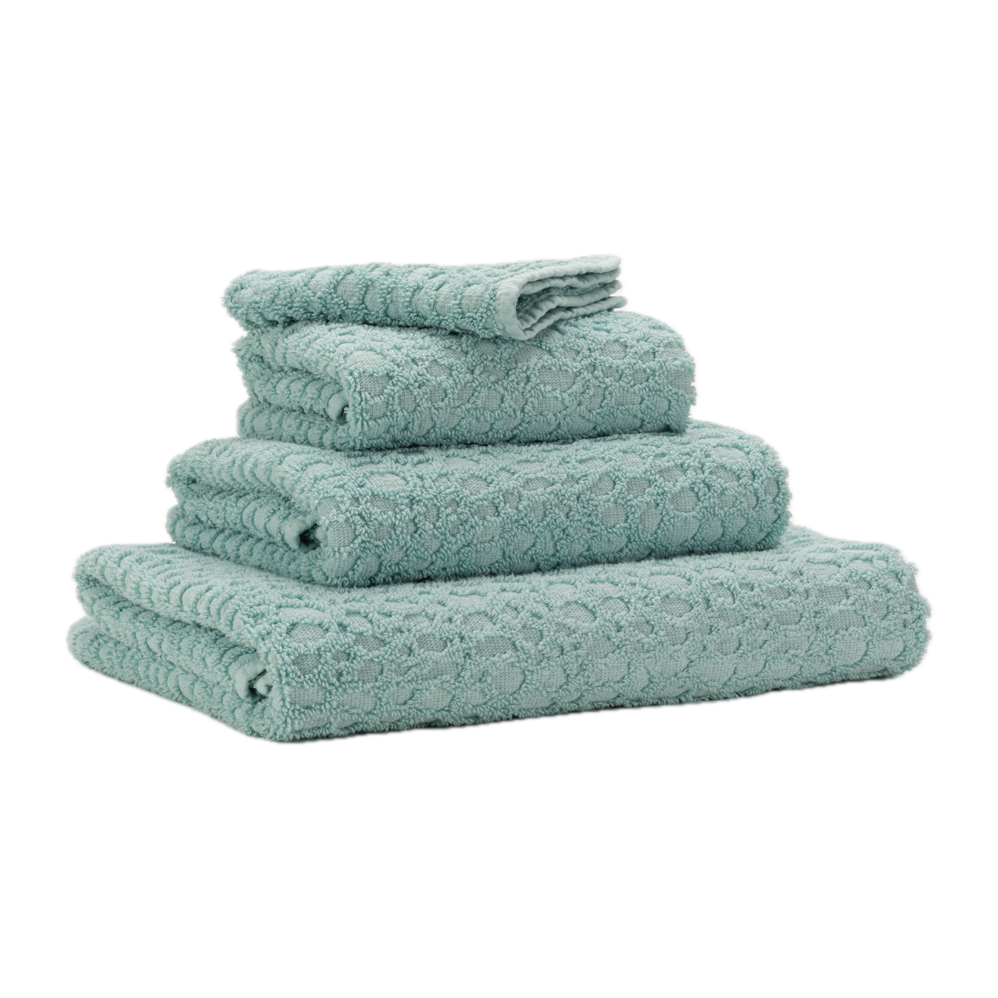 Corner View of Abyss Lodge Bath Towels in Ice Color